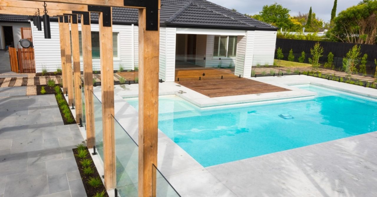 back garden with alfresco area flowing to pool