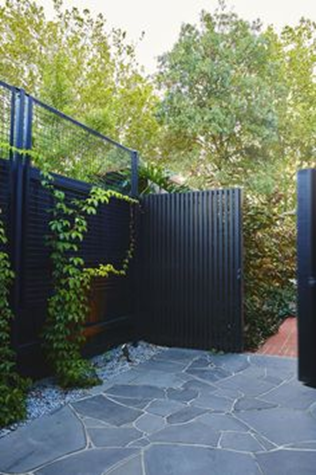 Paint-or-repaint-your-boundary-fences-black